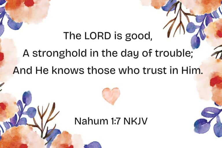 Bible verse from Nahum 1:7 NKJV, Used to illustarte the post Praying for Your Grandchildren's Safety and Protection. The picture is has watercolor flowers as the border. The flowers are round and in shades of peach. The leaves are blue.