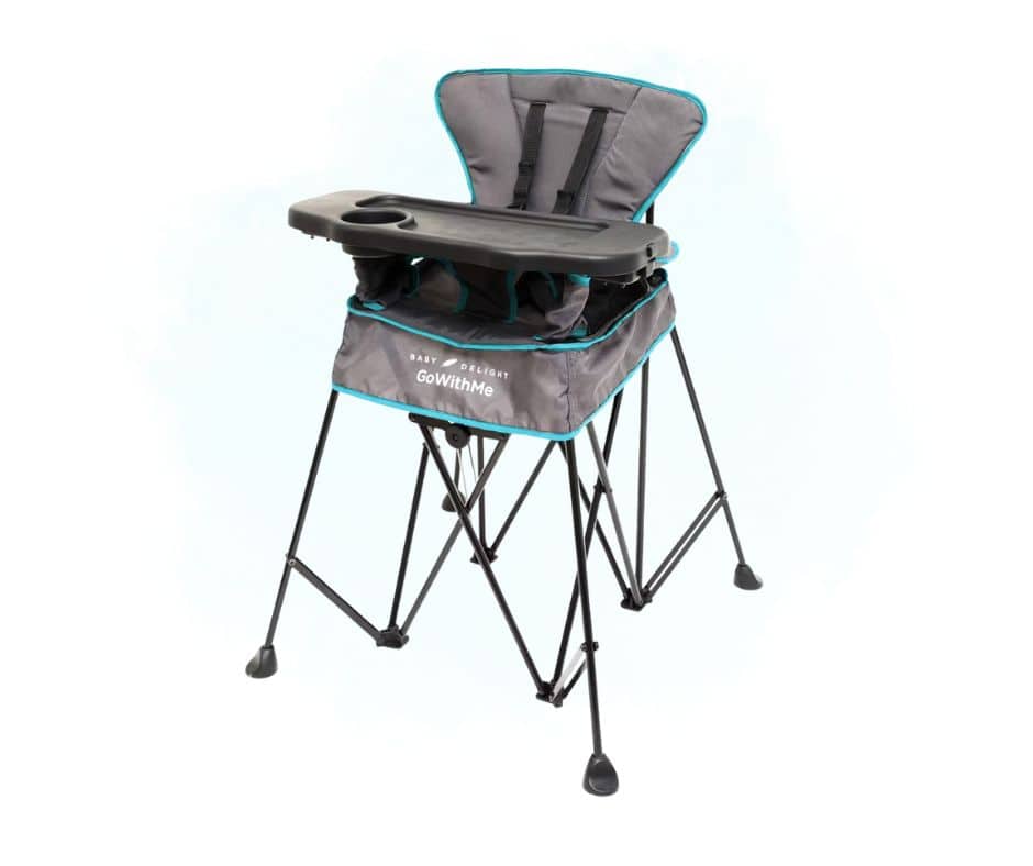 Picture of a folding highchair for babies. It is a gray chair with a dark gray tray. Used to illustrate the blog post What does a first-time grandma need?