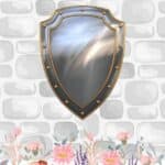 Feature image for the Psalm 91 prayer cards post. It shows a brick wall with a flower border along the bottom. On the wall in a silver metal shield with gold rivets.