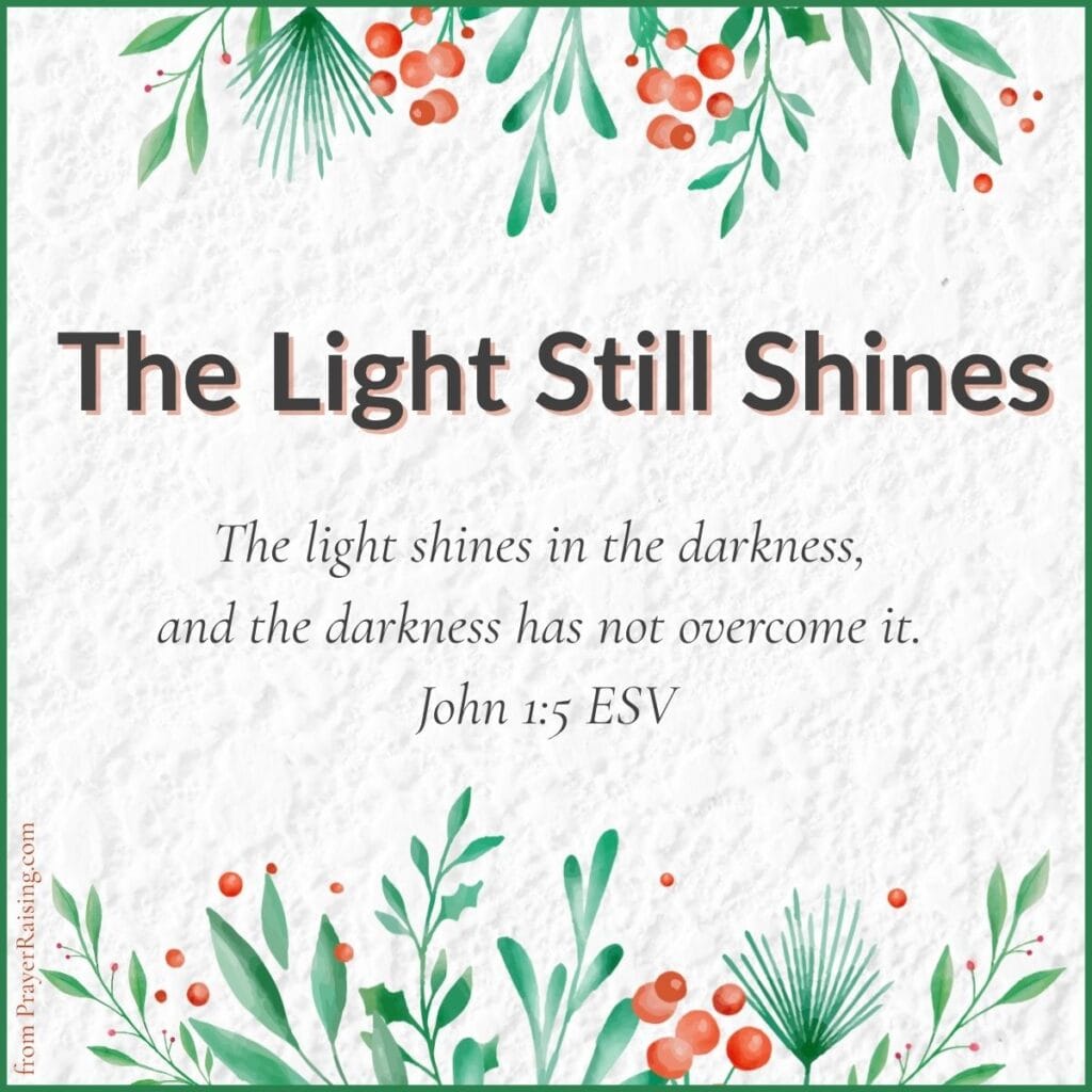 Number 1 of 15 Inspiring Christmas quotes. It says "The Light Still Shines". It is followed by a Bible verse from John 1:5: The lgiht shines in the darkness, and the darkness has not overcome it. The border of the quote is Christmas foliage of leaves and berries.