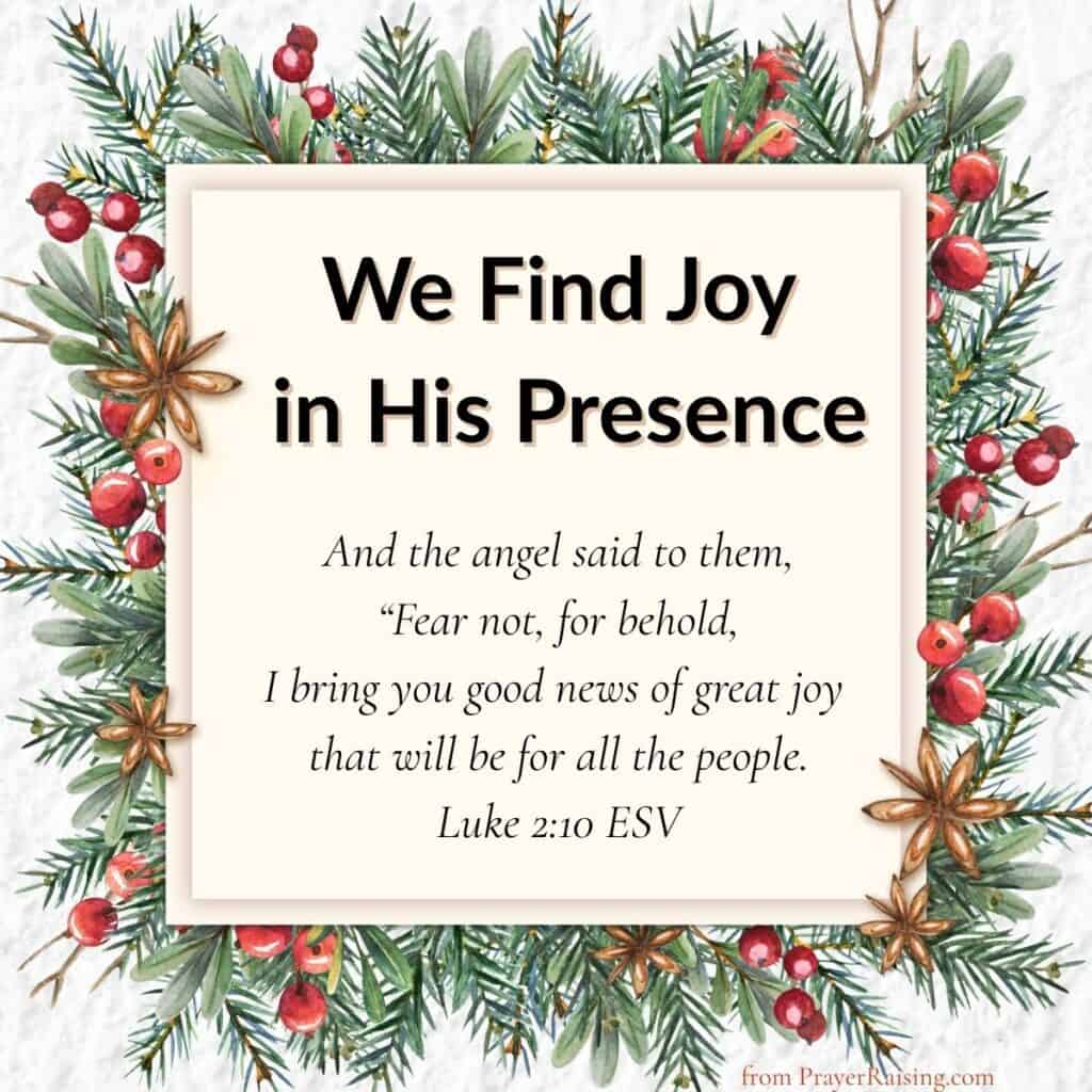 Number 3 of 15 Inspiring Christmas quotes. It says "We Find Joy in His Presence". It is followed by a Bible verse from Luke 2:10 that says: And the angel said to them, "Fear not, for behold, I bring you good news of great joy that will be for all the people. The writing is in a cream colored box surrounded by Christmas branches and berries.